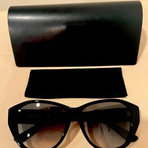 Authentic Yves Saint Laurent black/Gold Sunglasses.Make an offer